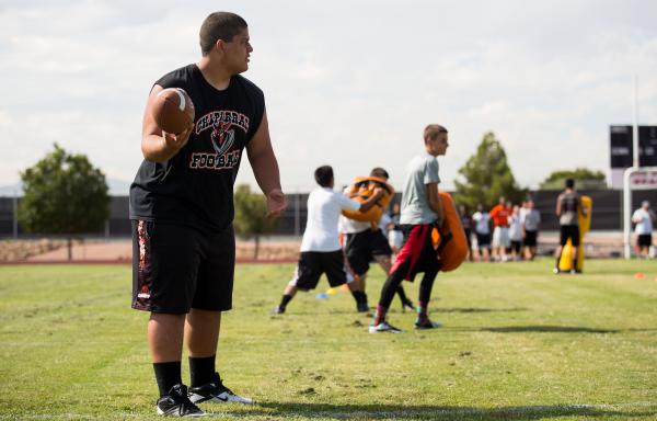 Chaparral’s Mark Jones participates in drills wearing new practice apparel puchased us ...