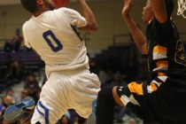 Desert Pines’ Julian Jacobs shoots against Clark during the Division I-A Southern Regi ...