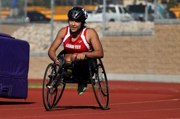 Arbor View senior Cheyenne Leonard warms up in her wheelchair on Friday during the Richard L ...