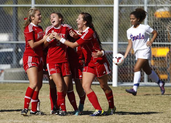 Arbor View soccer players celebrate a goal by Lexi Epley (3) during the Sunset Region champi ...