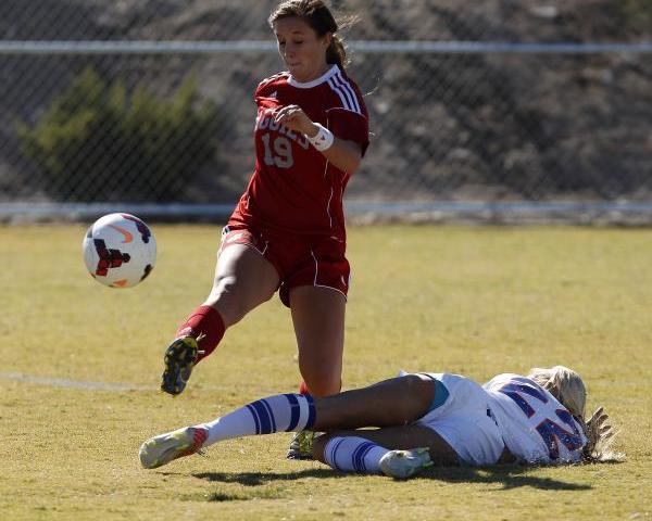 Arbor View’s Bailee Davis kicks the ball over Kaila Brinkman of Bishop Gorman during t ...