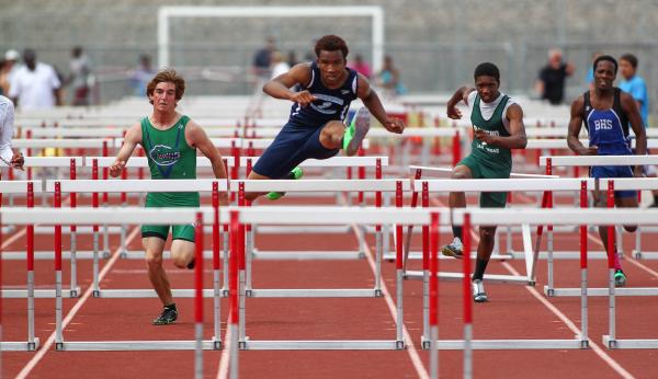 Canyon springs’ Demarcus Walker takes th lead in the Sunrise Region boys 110-meter hur ...