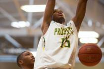 Ray Smith, a junior-to-be at Las Vegas High, dunks for the Las Vegas Prospects 16s in their ...