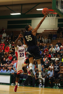 Canyon Springs’ Jordan Davis shoots over Valley’s Nick Brannon during the Sunris ...