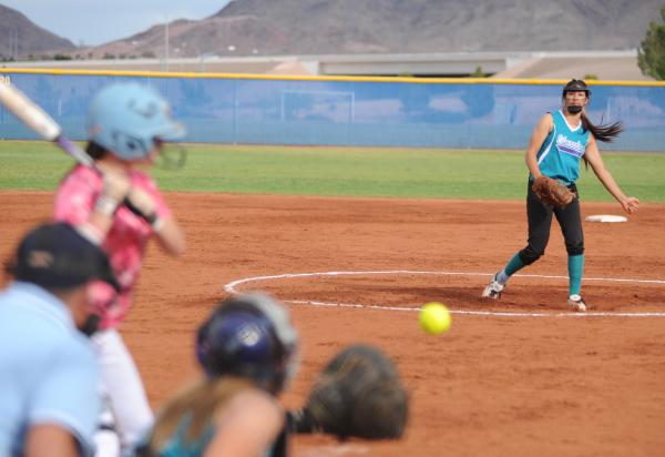 Foothill’s Gabby Canibeyaz slides around the tag of Silverado catcher Riana Splinter