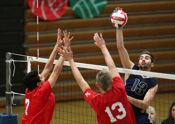 Foothill’s Blake Bootsma jumps to hit against Las Vegas’ Guillermo Gonzalez (7) ...