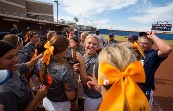 Centennial’s softball team celebrates after defeating Palo Verde 13-3 in the Sunset Re ...