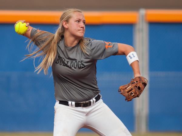 Centennial shortstop Heather Bowen fires to first during the fourth inning in the Bulldogs&# ...