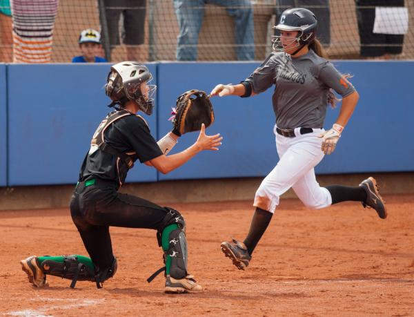 Centennial’s Mia Acuna scores a first-inning run as Palo Verde catcher Brooke Stover a ...