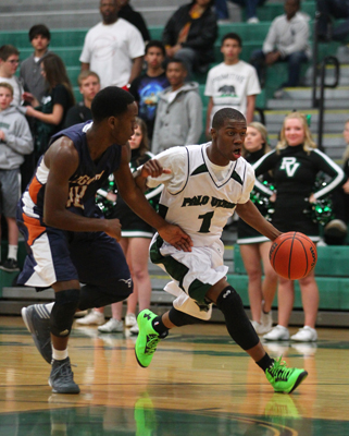 Palo Verde’s Eris Winder drives past Legacy during the Sunset Region quarterfinal at P ...