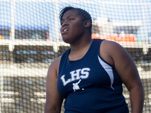 Liberty’s Ashlie Blake watches one of her throws during the Division I girls state tra ...