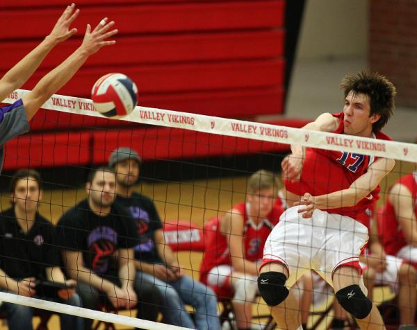 Valley’s Jack Heavey goes up for a kill