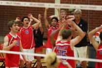 Valley players react after winning a point against Silverado