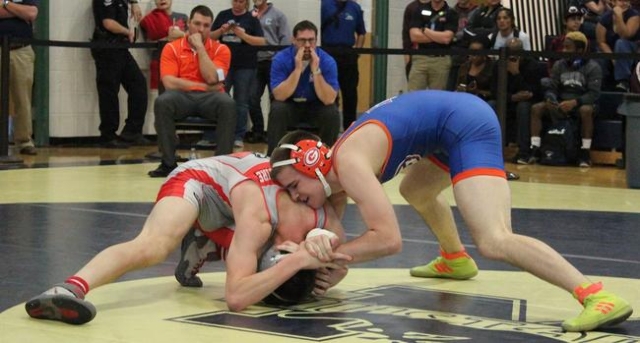 Bishop Gorman 152-pounder Justin Rekrut drives Arbor View‘s Lane Morgan-McGuire‘ ...