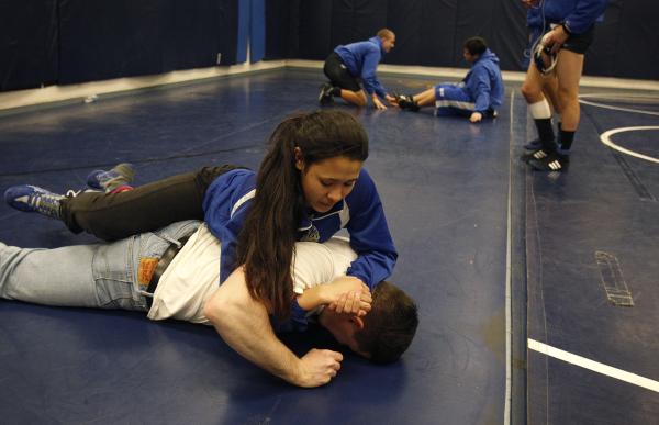 Sierra Vista wrestler Caroline Sauder warms up with Daniel Strbac before a dual meet at Sier ...