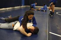 Sierra Vista wrestler Caroline Sauder warms up with Daniel Strbac before a dual meet at Sier ...