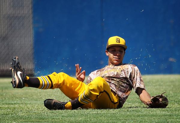 Bonanza center fielder Daniel Romero makes a sliding catch during the fifth inning Friday ag ...