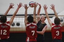 Coronado players, from left, Tyler Cucullu, Timothy McMoore-Tuamoheloa and Matt Pettit try t ...