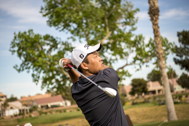 Desert Oasis golf team member Syouta Wakisaka swings during practice at Palm Valley Golf Cou ...