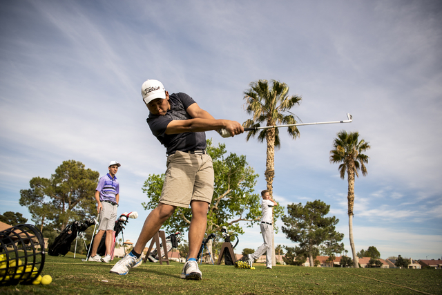 Desert Oasis golf team member Syouta Wakisaka swings during practice at Palm Valley Golf Cou ...