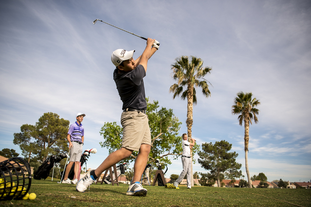 Desert Oasis golf team member Syouta Wakisaka swings during practice at Palm Valley Golf Cou ...