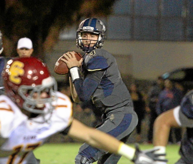 Saint John Bosco’s Josh Rosen looks for an open man against Central Catholic earlier t ...