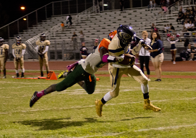 Cheyenne’s Deriontae Green (5) runs the ball into the end zone during their prep footb ...