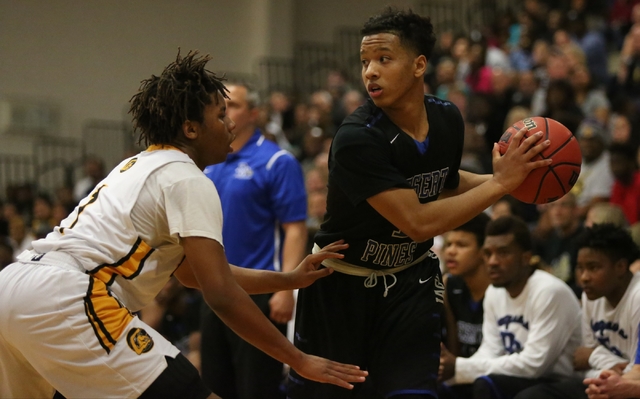 Desert Pines’ Capri Uzan (1) looks for an open teammate during last year’s Divis ...