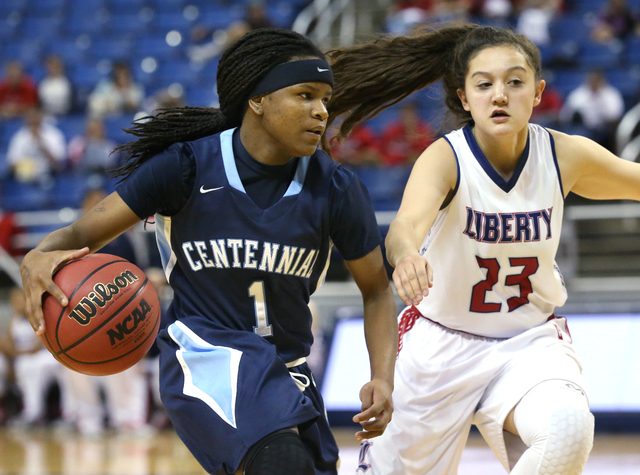 Liberty defender Alexis Tomassi pursues Centennial’s Pam Wilmore during the NIAA Divis ...