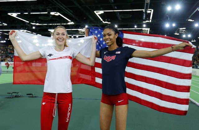 Bronze medal winner Kamila Licwinko of Poland (L) and gold medal winner Vashti Cunningham of ...