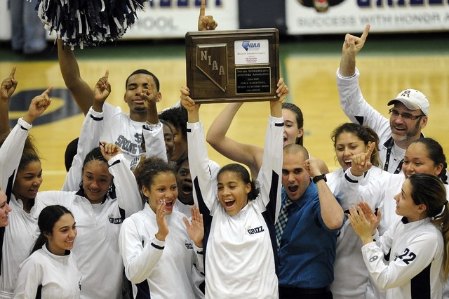 Spring Valley players celebrate their 63-55 win over Faith Lutheran the Division I-A Souther ...