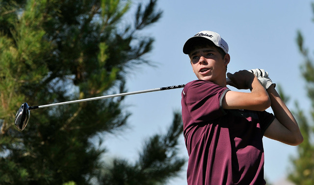 Cimarron-Memorial’s Brandon Smith tees off on the eighth hole during the final round o ...