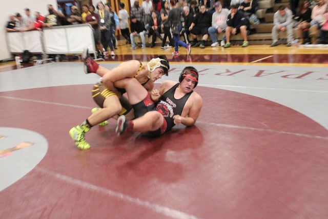 Bonanza 220-pounder Elias Aguilar takes down Desert Oasis’ Andrew Dean with a single-l ...