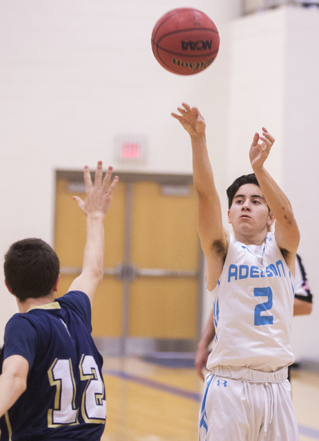 Adelson School’s Ben Elharrar (2) shoots a three point shot over Lake Mead’s Sea ...