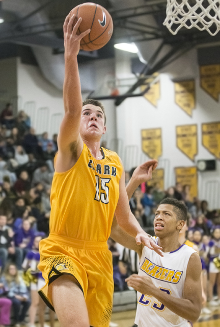 Clark’s James Bridges (15) drives past Durango’s Jeremie Portuondo (32) during t ...