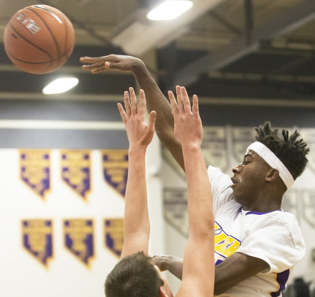 Durango’s Vernell Watts (22) makes an entrance pass past Clark’s James Bridges ( ...