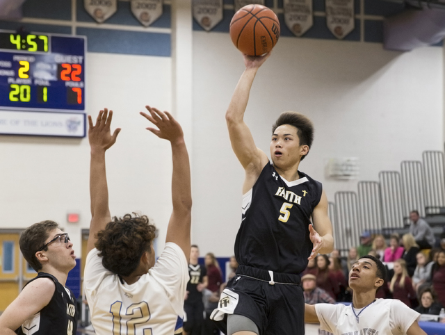 Faith Lutheran’s Isaac Ng (5) shoots over Sierra Vista’s Maui Sera Josef (12) on ...