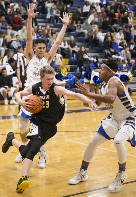 Faith Lutheran’s Brevin Walter (23) drives baseline past Sierra Vista’s Chris M ...