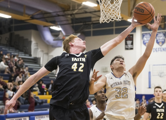 Faith Lutheran’s Elijah Kothe (42) fights for a rebound with Sierra Vista’s Maka ...