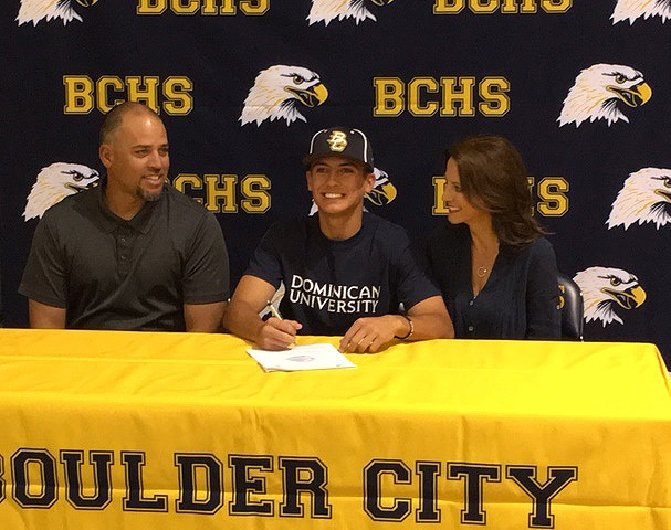 Michael Morelli, center, signs his National Letter of Intent to play at Dominican University ...