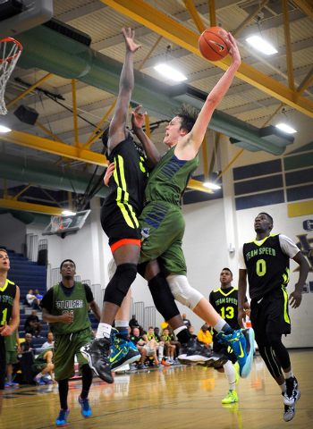 Oakland Soliders’ Stephen Zimmerman (33) shoots against Team Speed’s Adeolu Ades ...