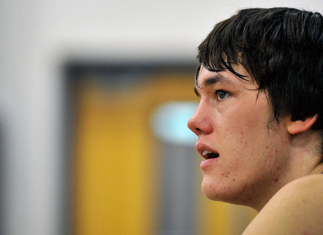 Oakland Soliders’ Stephen Zimmerman watches from the bench during a Las Vegas Classic ...