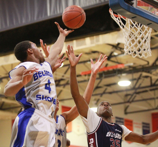 Belmont Shore’s Nick Blair (4) reaches to tip in a shot over Upward Stars’ Malik ...