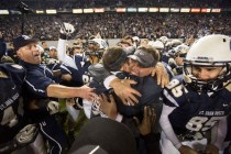 St. John Bosco’s head coach Jason Negro celebrates with his team after defeating De La ...