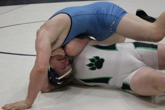 Palo Verde’s Cole Judd (bottom) locks up Centennial’s Hunter Brown in the 195-po ...