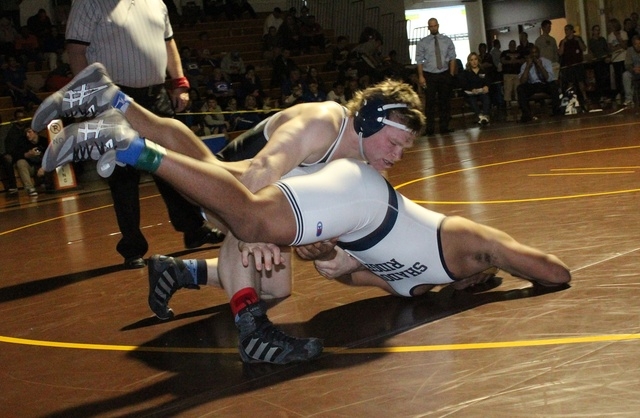 Centennial’s Hunter Brown (top) won the 195-pound Sunset Regional title for a second s ...