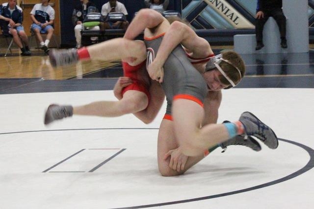 Bishop Gorman’s Mason Campbell takes a double leg shot on Arbor View’s Tyler Ram ...