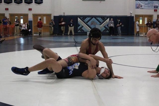 Cimarron-Memorial’s Omeed Chamanzad works the top position, on his way to a win in the ...