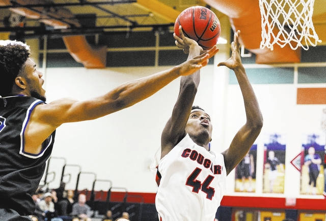 Coronado’s Taieem Comeaux (44) shoots over Desert Pines’ Trevon Abdullah-Booker ...