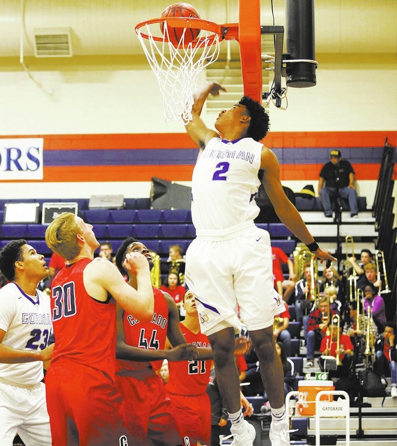 Bishop Gorman’s shooting guard Jamal Bey (2) takes a shot against Coronado during a b ...